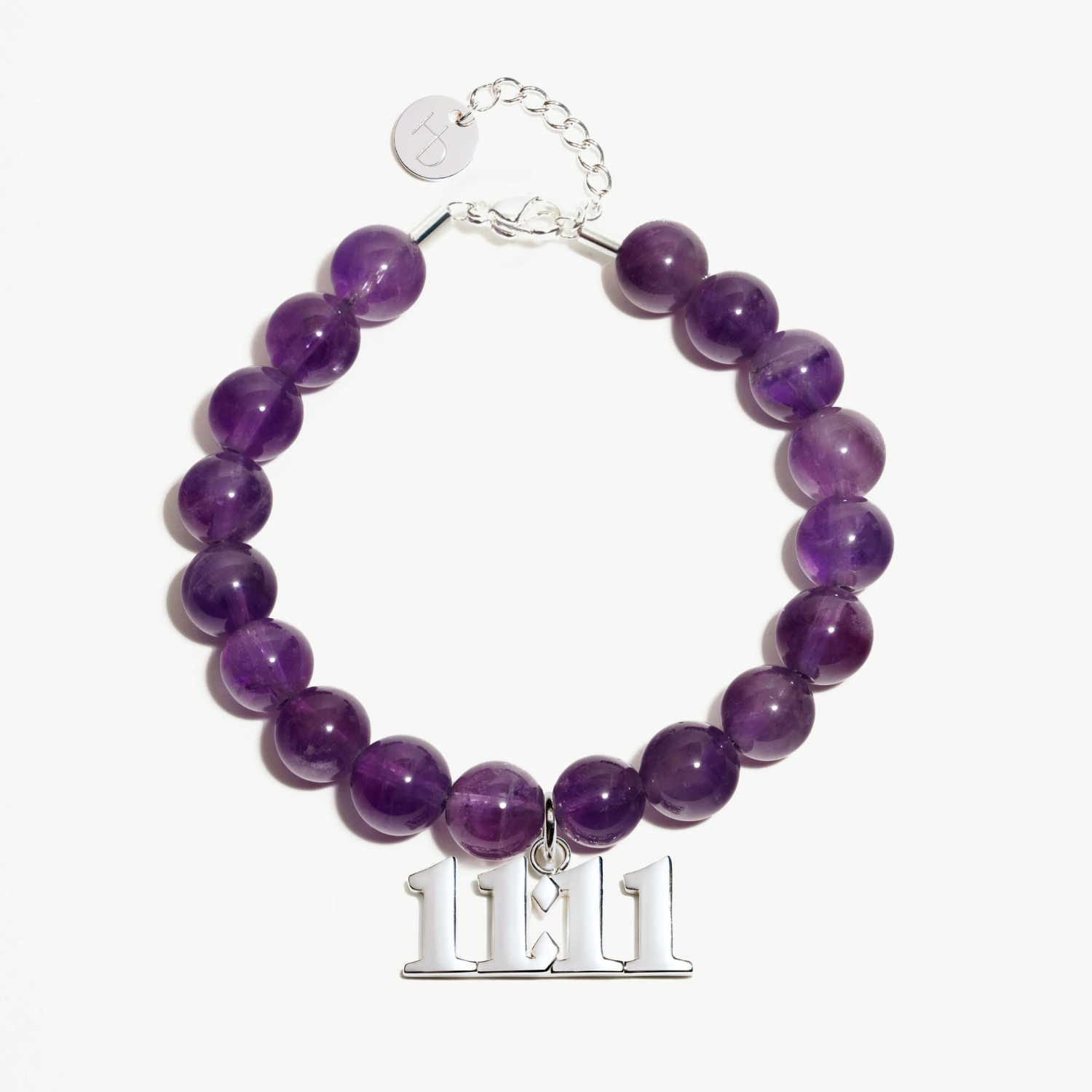 1111 Amethyst beaded bracelet with adjustable clasp closure. 1111 Silver Charm