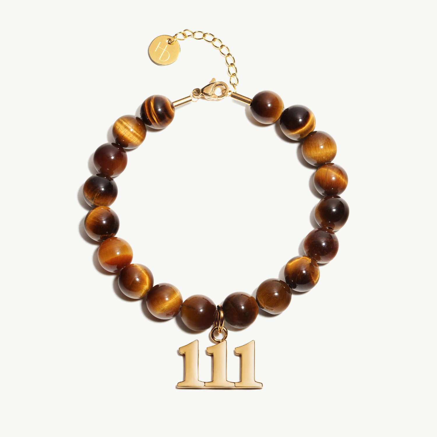 111 Tigers Eye beaded bracelet with adjustable clasp closure. 111 Gold Charm