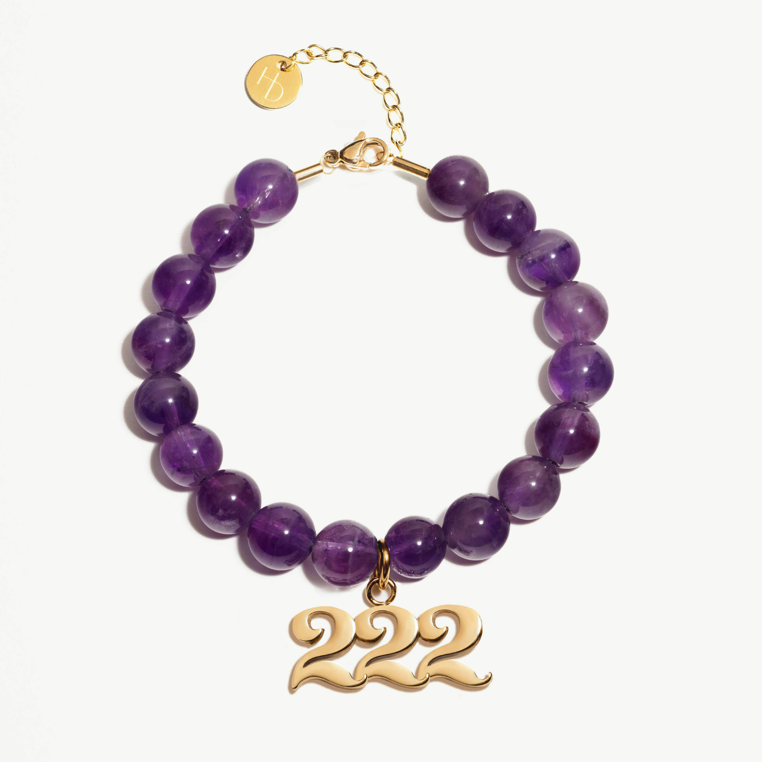 222 amethyst beaded bracelet with adjustable clasp closure. 222 gold charm.
