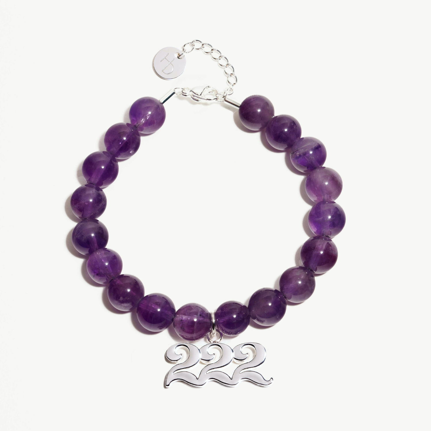 222 Amethyst beaded bracelet with adjustable clasp closure. 222 Silver Charm