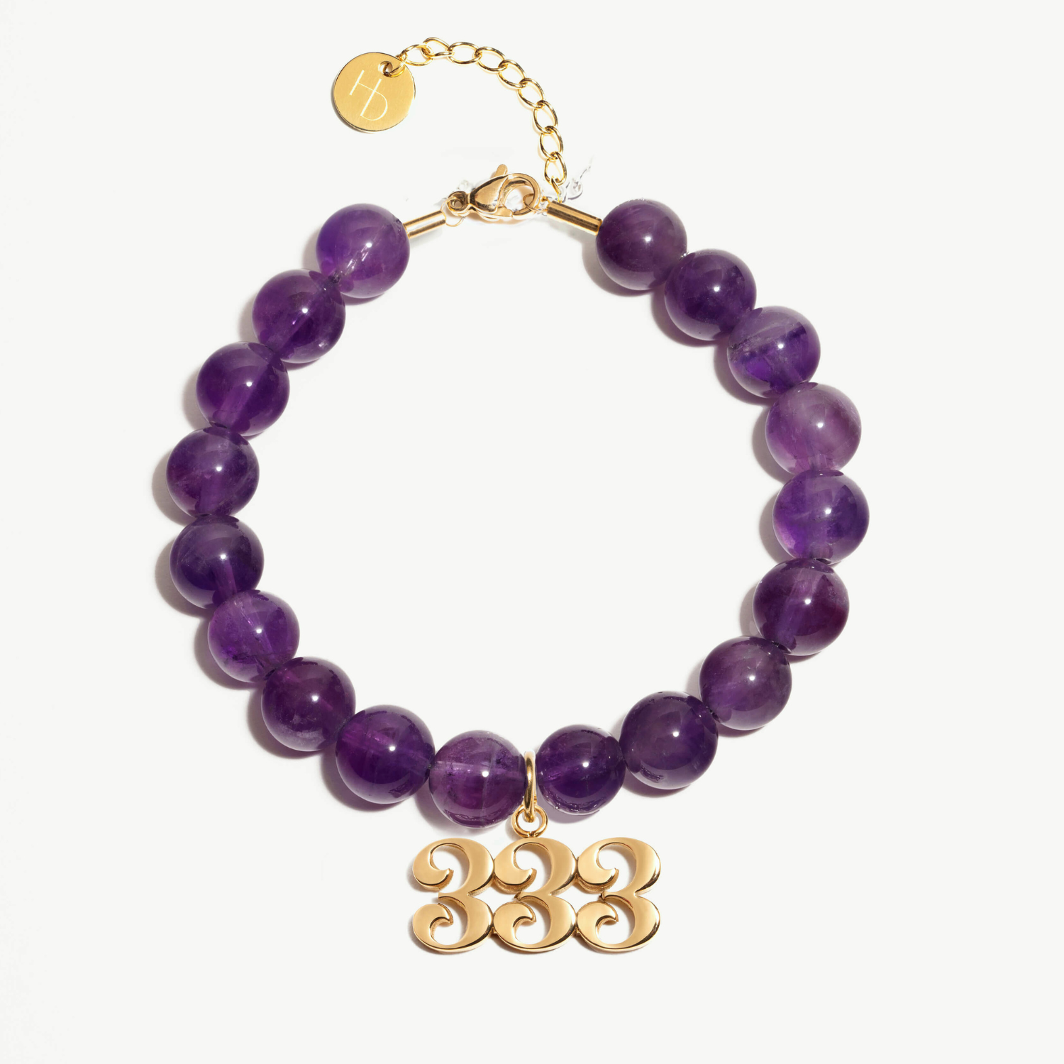 333 amethyst beaded bracelet with adjustable clasp closure. 333 gold Charm