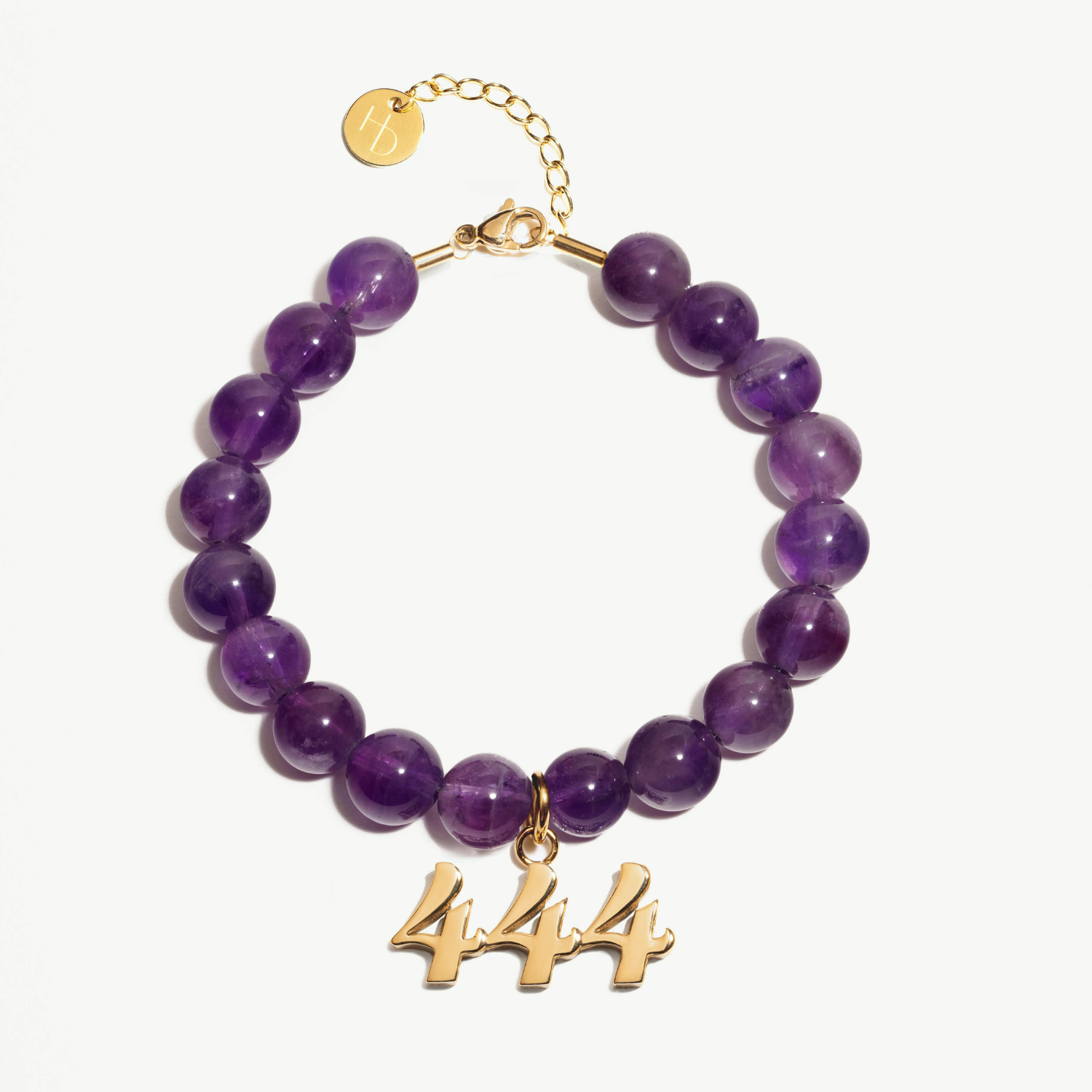 444 amethyst beaded bracelet with adjustable clasp closure. 444 gold charm.