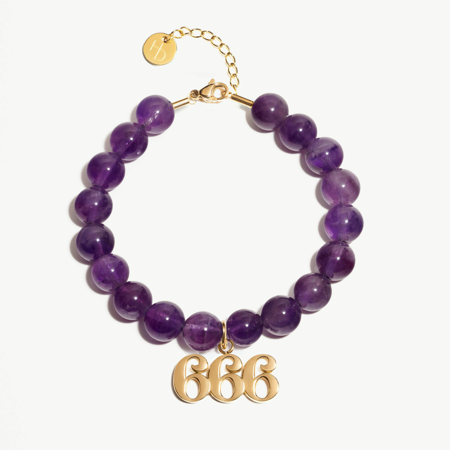 666 Amethyst beaded bracelet with adjustable clasp closure. 666 gold Charm