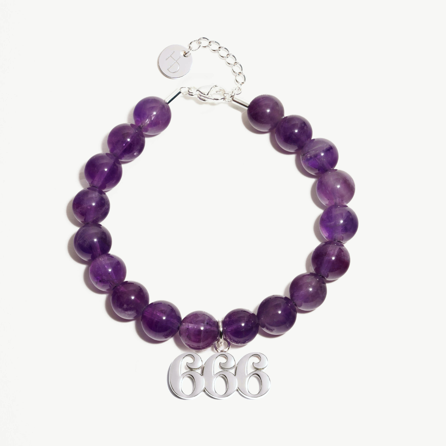 666 Amethyst beaded bracelet with adjustable clasp closure. 666 Silver Charm