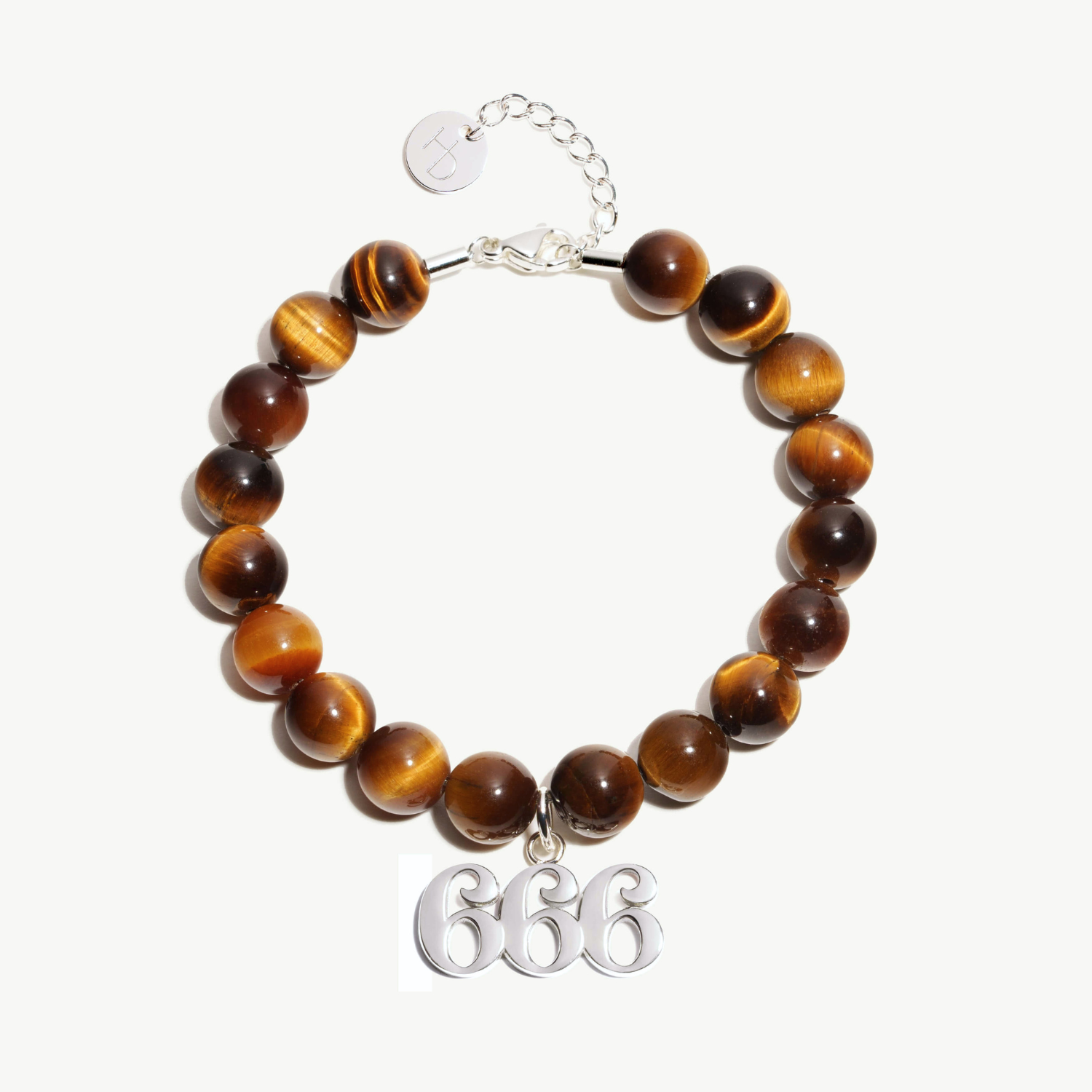 666 Tigers Eye beaded bracelet with adjustable clasp closure. 666 Silver Charm