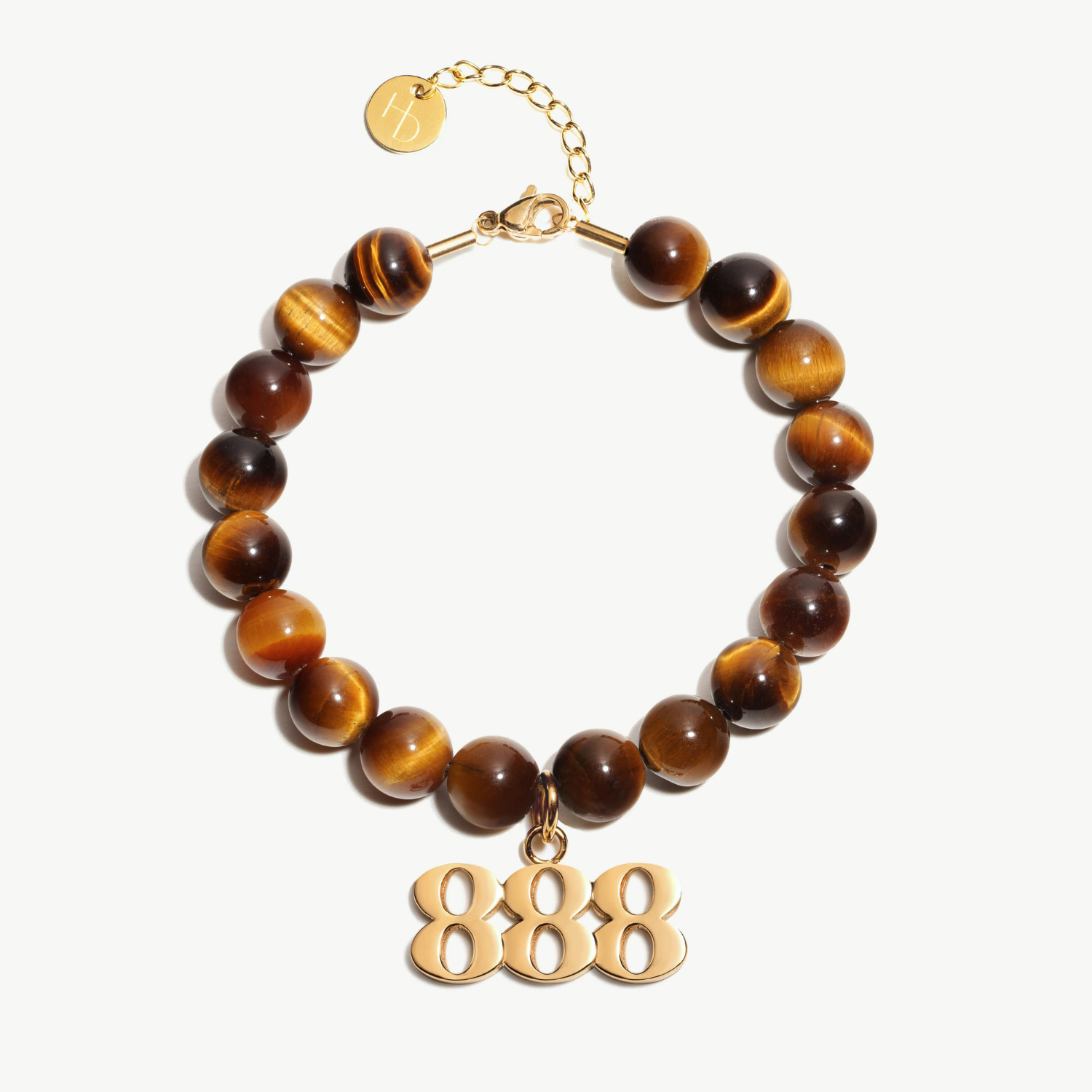 888 Tigers Eye beaded bracelet with adjustable clasp closure. 888 Gold Charm