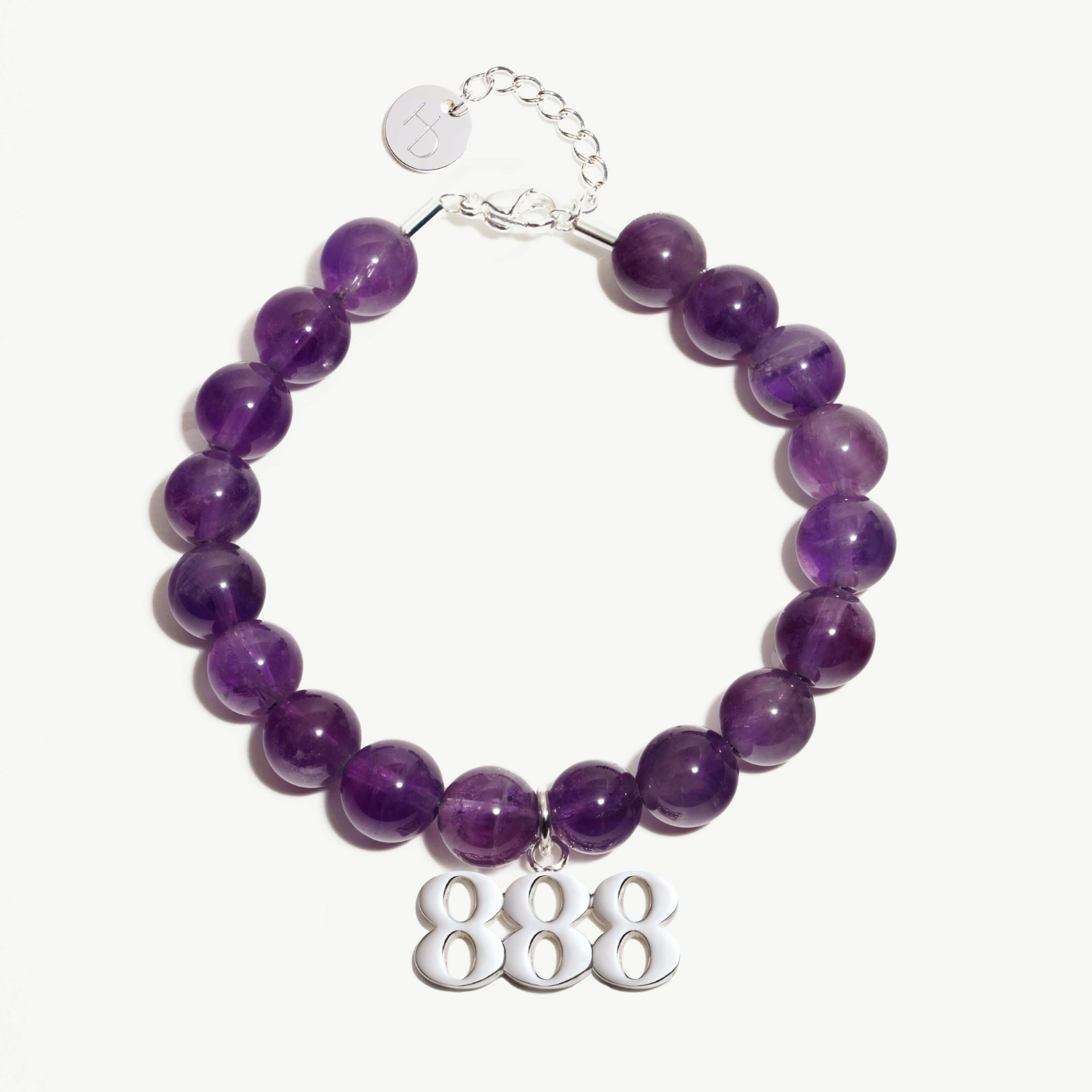 888 Amethyst beaded bracelet with adjustable clasp closure. 888 Silver Charm
